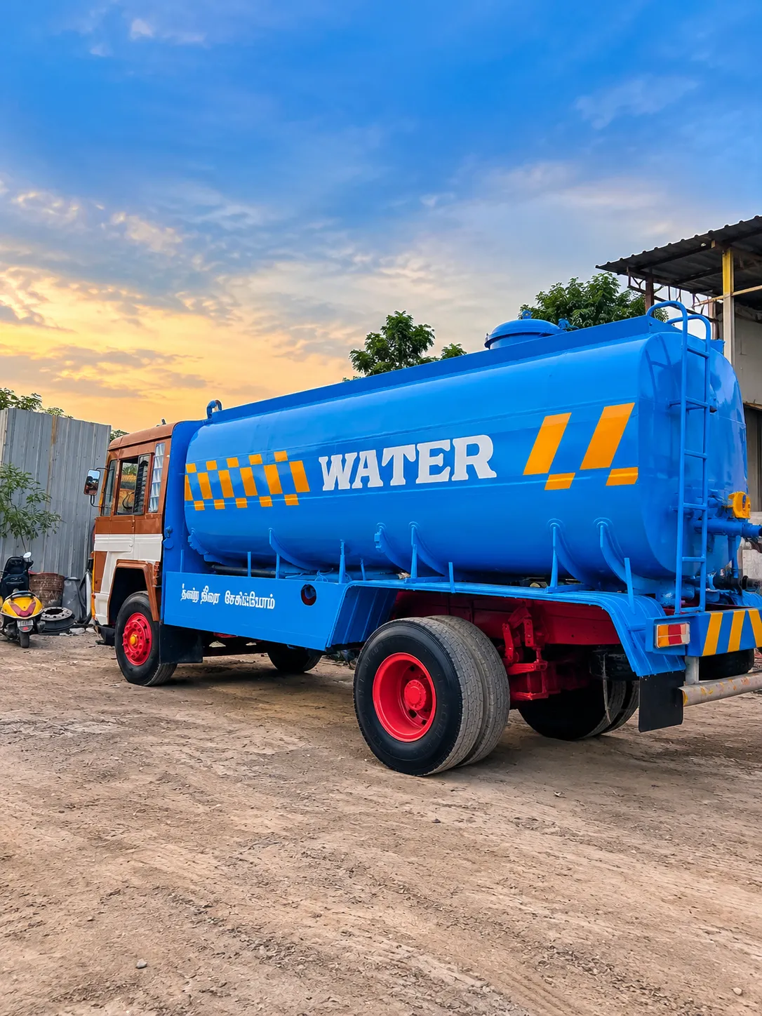 vibrant-blue-water-tanker-at-dusk